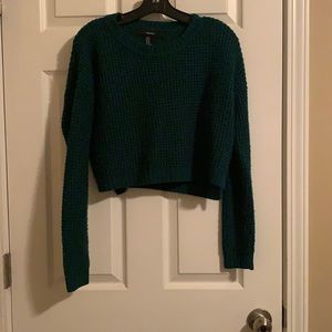 Cropped green sweater